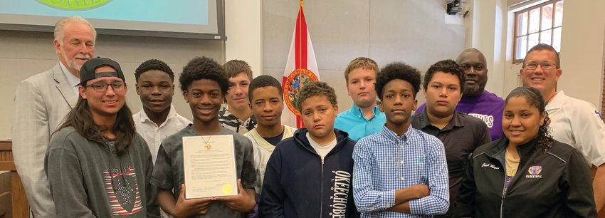 The Okeechobee Bulls traveling football team was honored Dec. 2 by the Okeechobee County Commission.